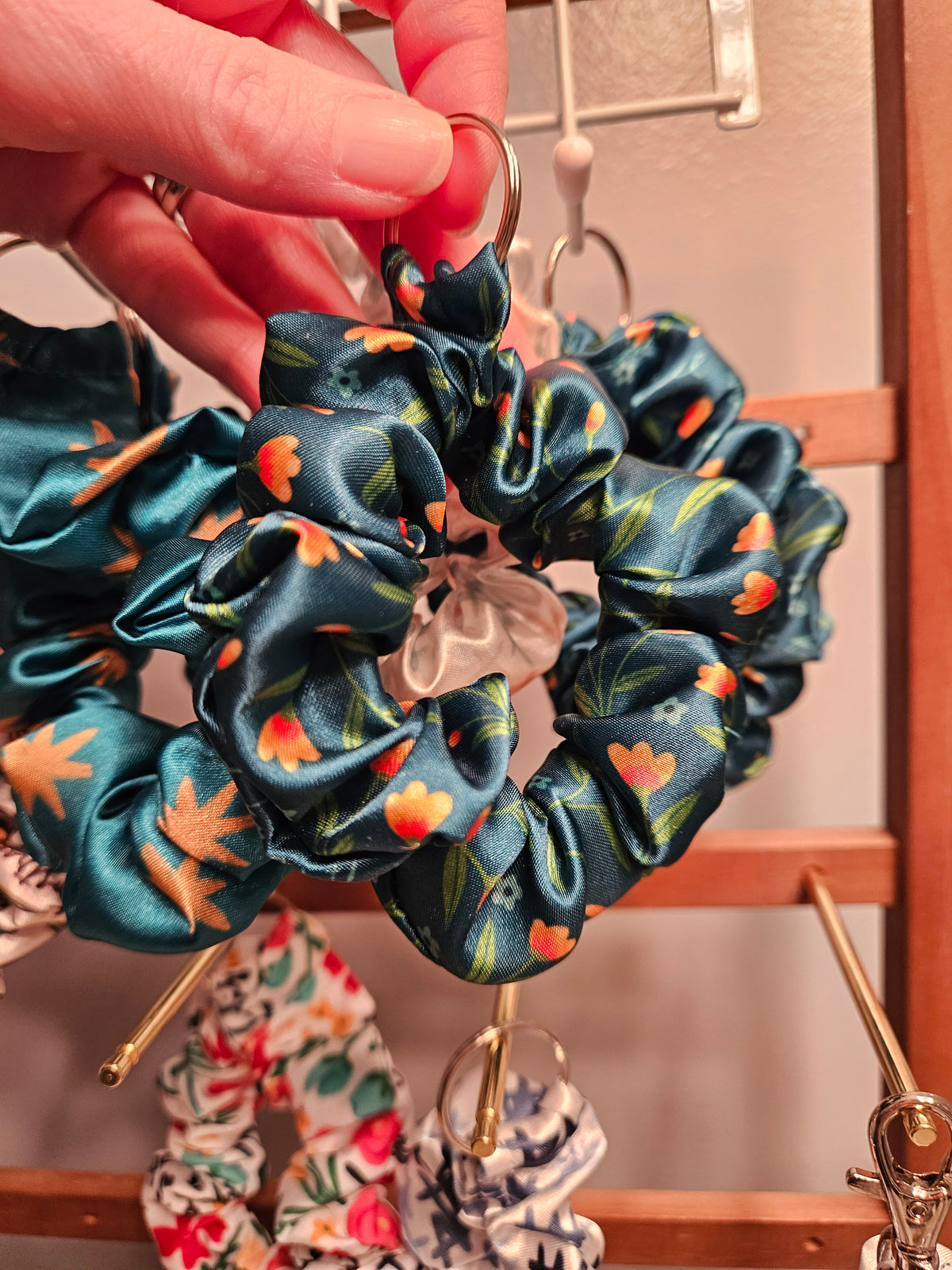 Scrunchie-style Catholic fabric wristlets with clasp claw as a keychain