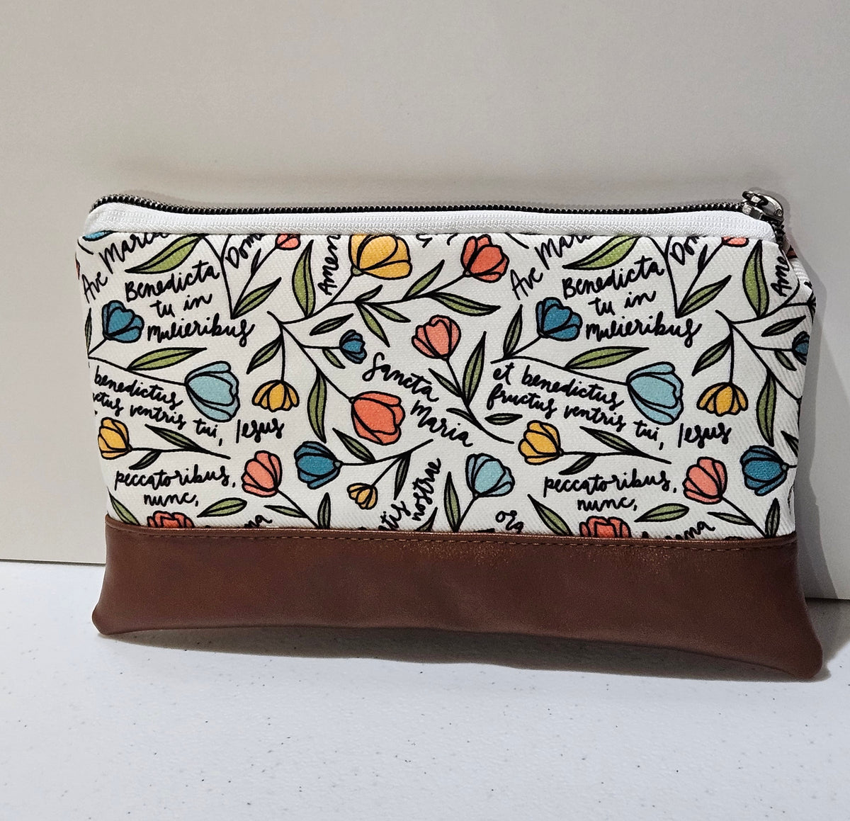 Faux Leather Ave Maria clutch with wristlet