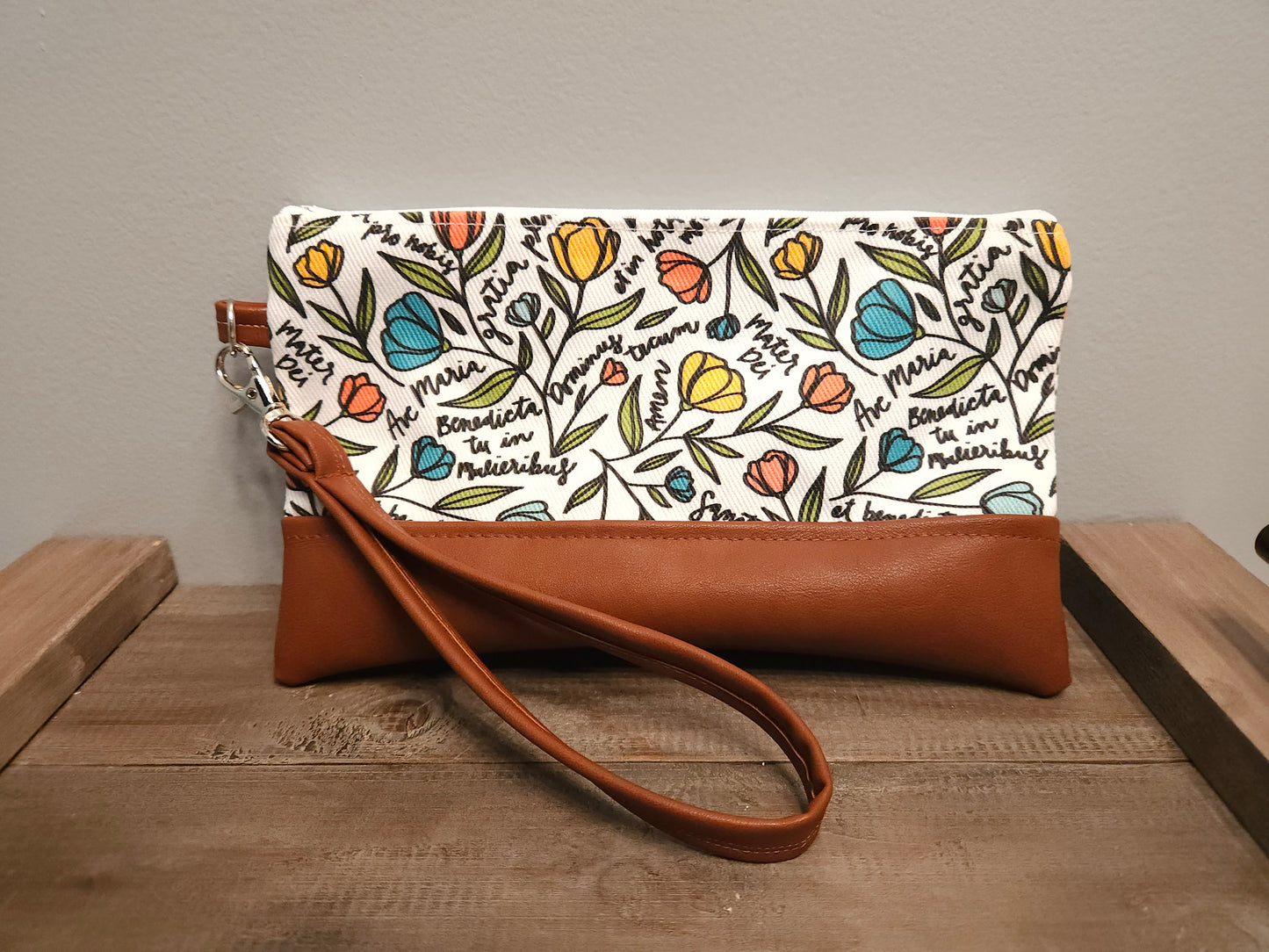 Faux Leather Ave Maria clutch with wristlet