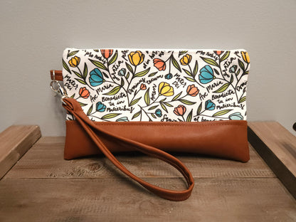 Faux Leather Ave Maria clutch with wristlet