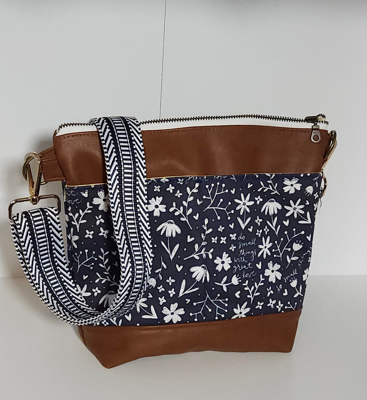 Medium Catholic crossbody with exterior slip pockets in the Melissa Collection