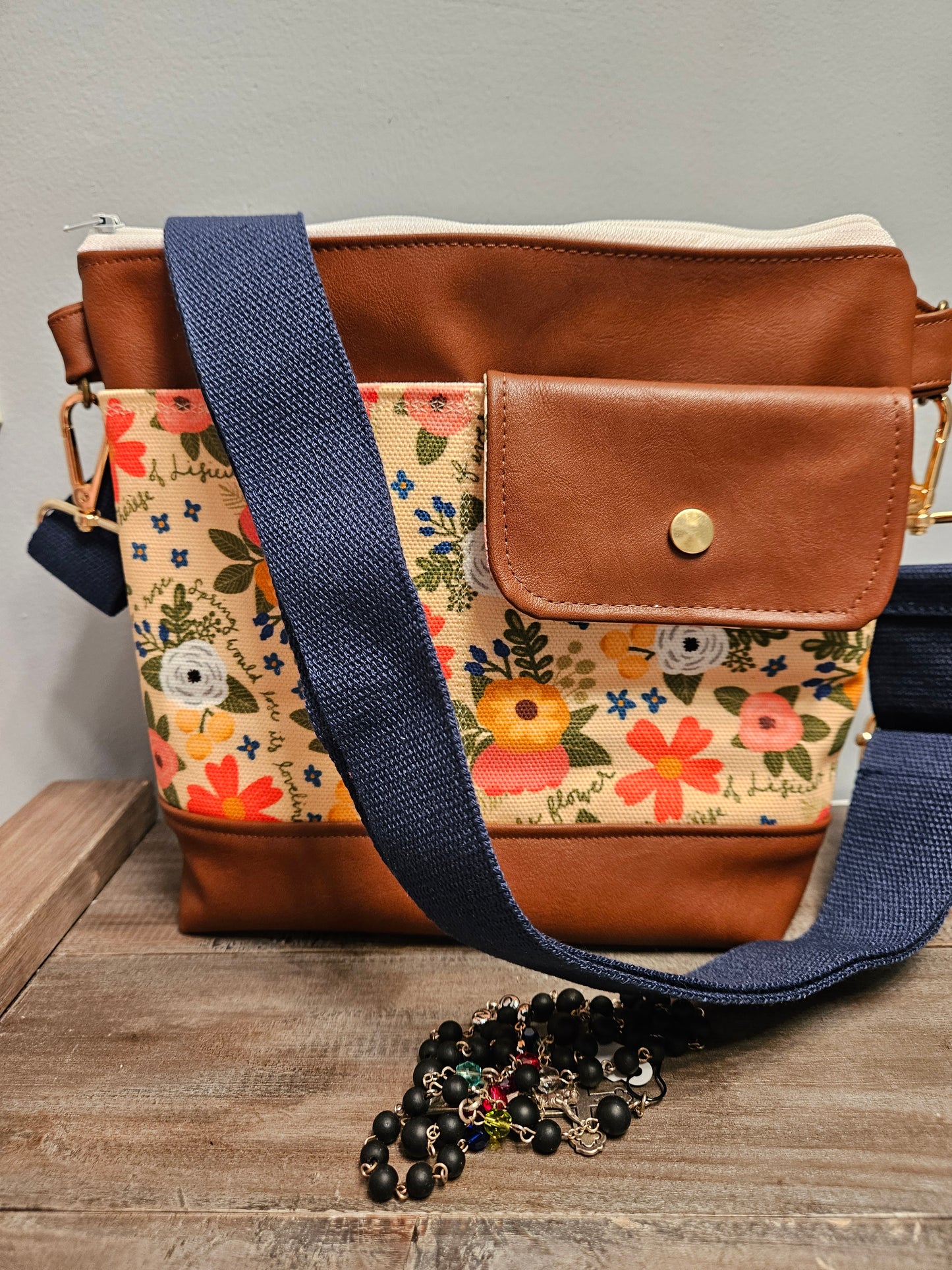 Medium Catholic crossbody with exterior slip pockets in the Melissa Collection