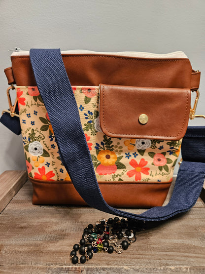 Medium Catholic crossbody with exterior slip pockets in the Melissa Collection