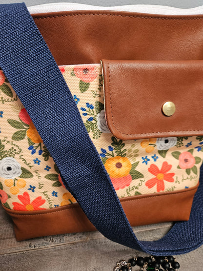 Medium Catholic crossbody with exterior slip pockets in the Melissa Collection