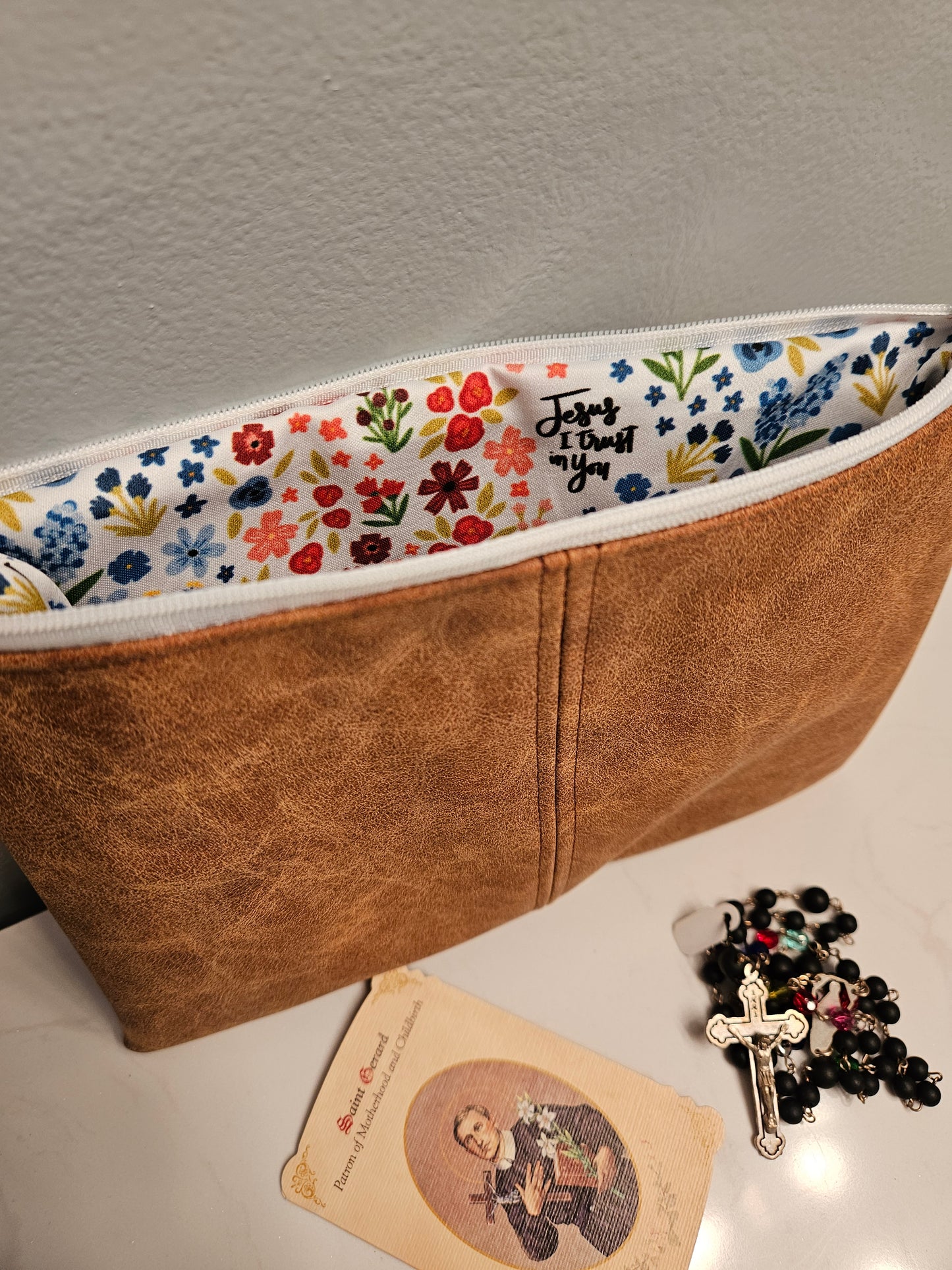 Faux leather pouches with Catholic fabric interior