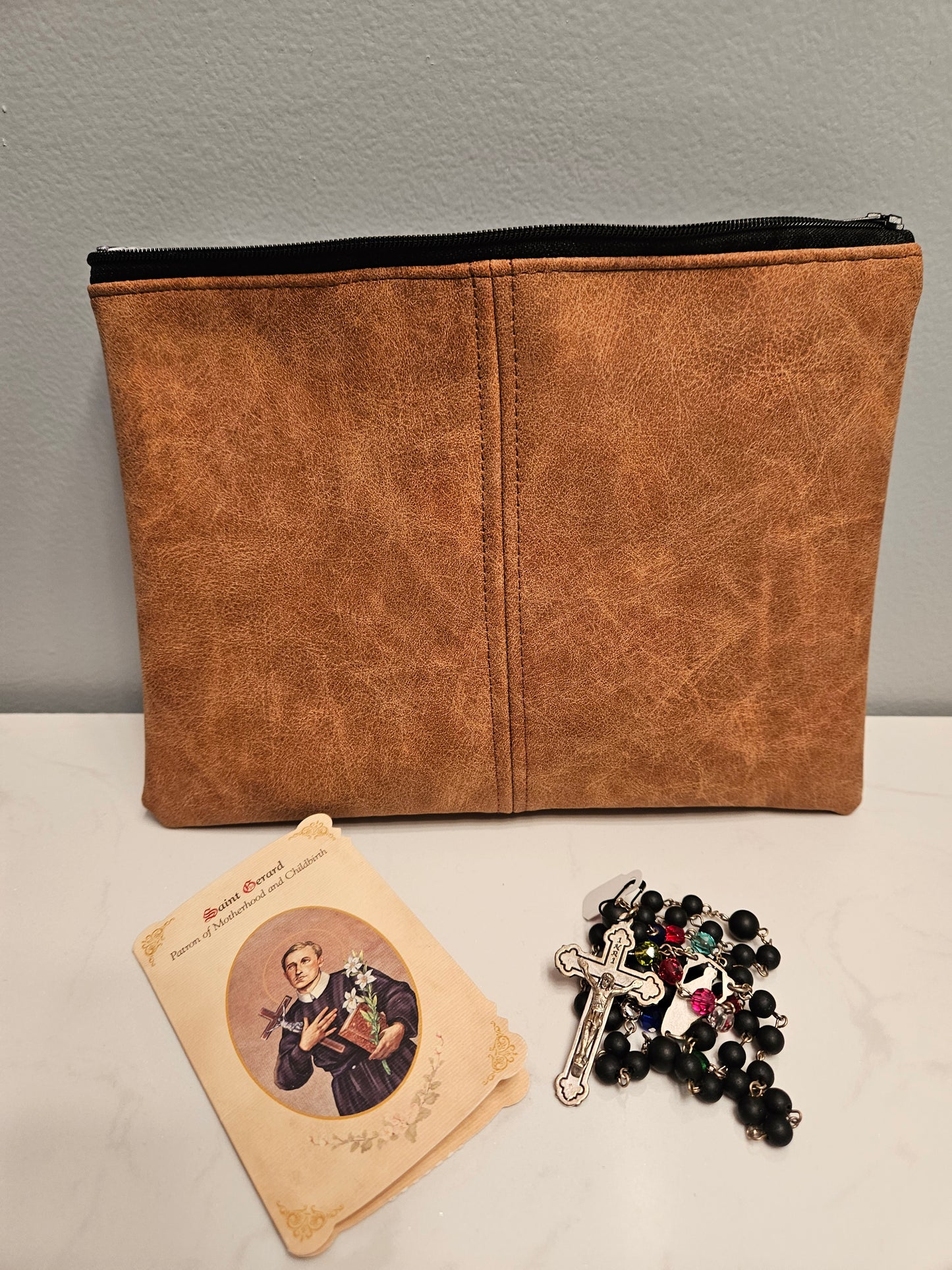 Faux leather pouches with Catholic fabric interior