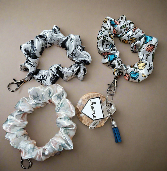 Scrunchie-style Catholic fabric wristlets with clasp claw as a keychain