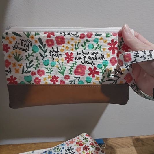 Clutch with wristlet video