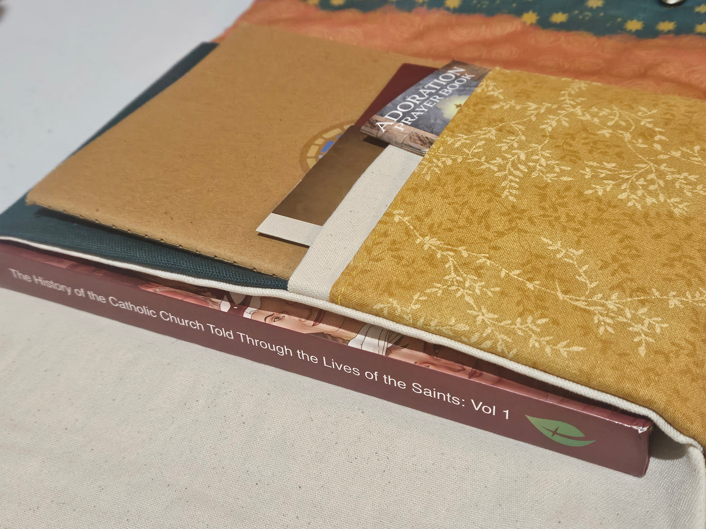 Book cover for The Word Among Us booklets- Variety of Catholic designs